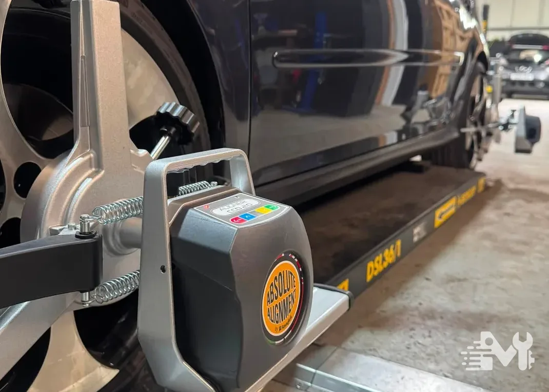 Four wheel alignment equipment set up on a car at the Milners workshop in Settle